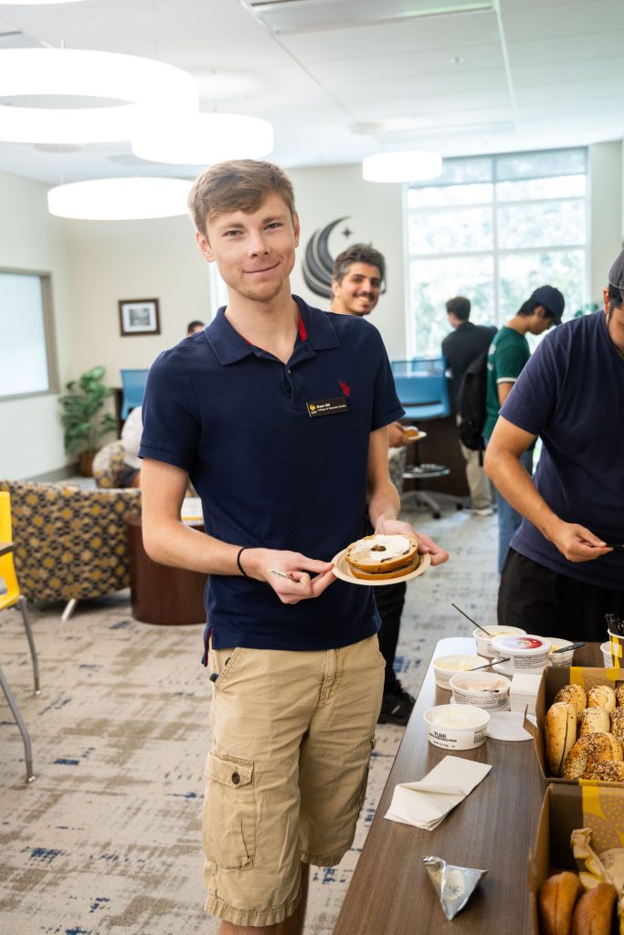 Ryan Hill, Thesis and Dissertation Graduate Assistant, participates in First Wednesday Bagel event at the Graduate Student Center