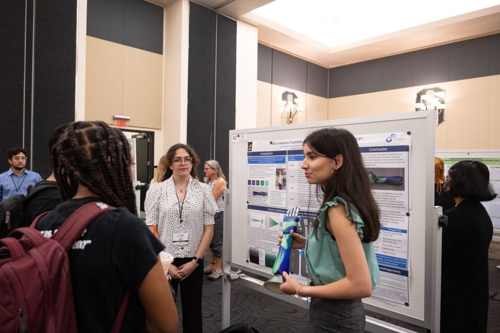 Kelsey Robinson and Viviana Rivera presenting at Student Research Week