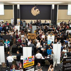 Students, faculty, and staff in the Pegasus Ballroom for Grad Fair