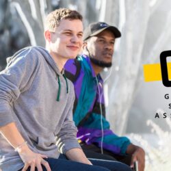 three students sitting and staring aimlessly