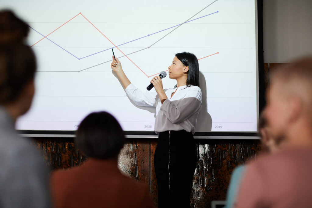 Woman presenting to a classroom