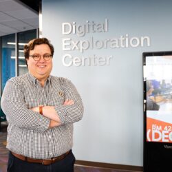Eric Thompson ’19, a history alum pursuing a doctorate in texts and technology, enjoys bringing history to life beyond the classroom, in places like museums, parks monuments and the UCF Libraries’ Immersion Studio. (Photo by Brooke Morris ’22)